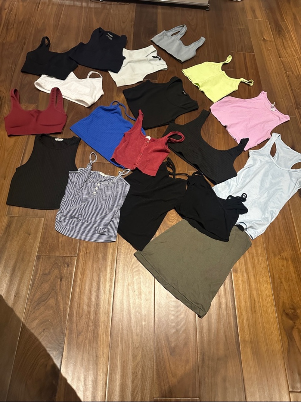 Set of 27 tank tops and sports bras. Various brands, various sizes.